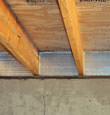 SilverGlo™ insulation installed in a floor joist in Blackfoot
