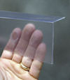 Closeup of a clear plastic covering on a Rexburg crawl space block wall