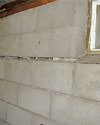 Severely buckling foundation walls in a home in Eagle in need of repairs.