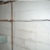 Severe foundation damage from a long crack in a bucking wall of a Mountain Home home.