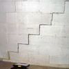 A diagonal stair step crack along the foundation wall of a Burley home
