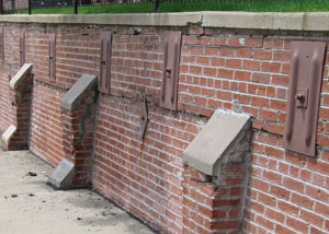 Rusted wall plate anchors in a retaining wall repair in Weiser.