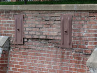 A collapsing, crumbling retaining wall in Preston