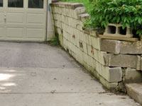 a failing retaining wall around a driveway in Boise