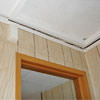 The ceiling and wall separating as the wall sinks with the slab floor in a Jerome home
