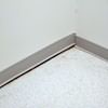 A partition wall separating from the floor in a Hayden home.