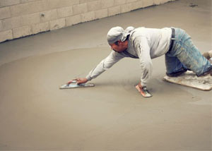 smoothing out the grout in a slab releveling project in Caldwell