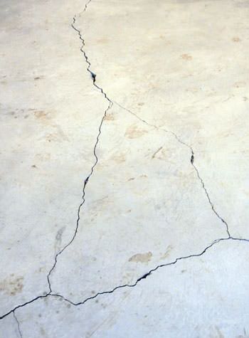severely cracked, heaving slab floors in a home in Rathdrum