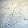 foundation heaving cracks in a slab floor in Meridian