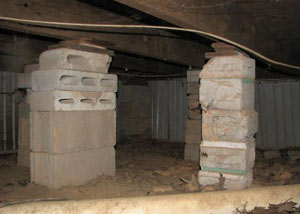 crawl space repairs done with concrete cinder blocks and wood shims in a Jerome home