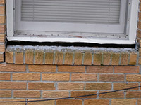 A window sill cracking and separating from the foundation wall in a Emmett home.