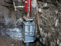 Foundation repair contractors lifting a structure in Idaho Falls.