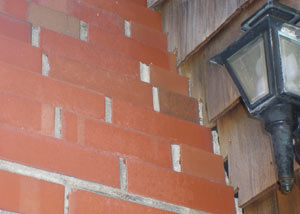 a repaired chimney in Burley that had shown serious foundation damage and was repaired with a helical pier system.