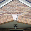 Major tuckpointing on a home archway over a door, with tuckpointing several inches wide that has failed on a Boise home