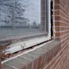 A gap in a window along the outer wall due to foundation settlement of a Mountain Home home.