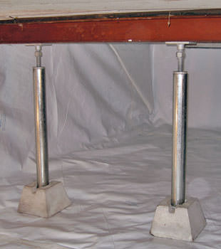 Crawl space jack posts installed in conjunction with a crawl space vapor barrier in Mountain Home