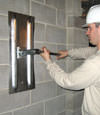 Tightening a wall anchor plate in Meridian, Idaho