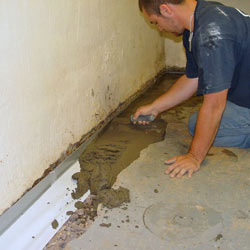Testing a French drain system in a Rexburg home.