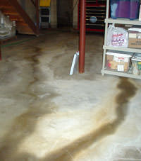 Flooding entering a basement through a floor crack in Eagle