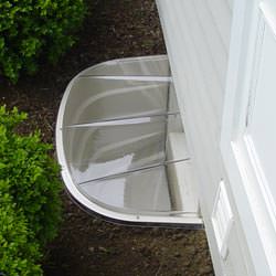 A covered window well in Payette