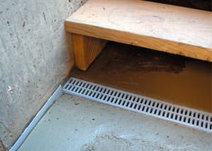 a hatchway entrance in Eagle that has been protected from flooding by our TrenchDrain basement drainage system.